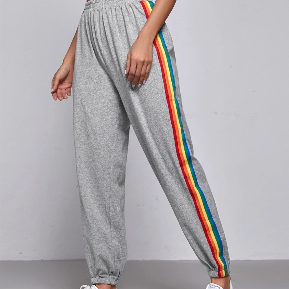 Gray drawstring sweatpants with rainbow stripe